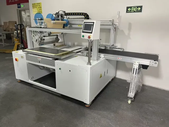 Custom Wide-Format Tape Applicator with Outfeed Conveyor — Custom wide-format tape applicator with outfeed conveyor