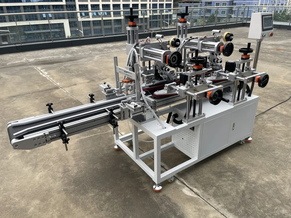 Clamping-Belt Dual-Head Tape Applicator — Rear view: infeed conveyor, two tape heads and cabinet