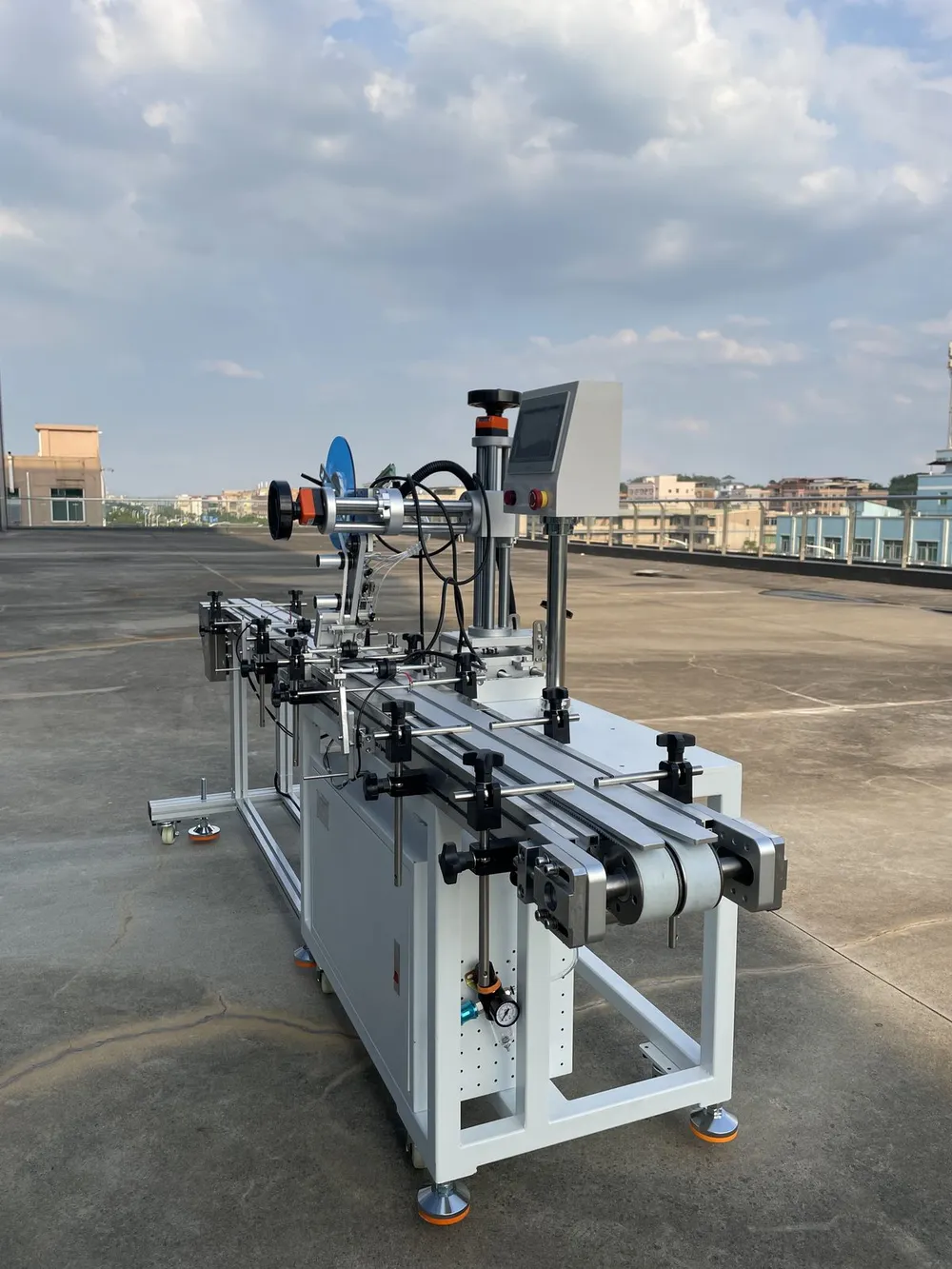 Inline Conveyor Tape Applicator — View along the conveyor
