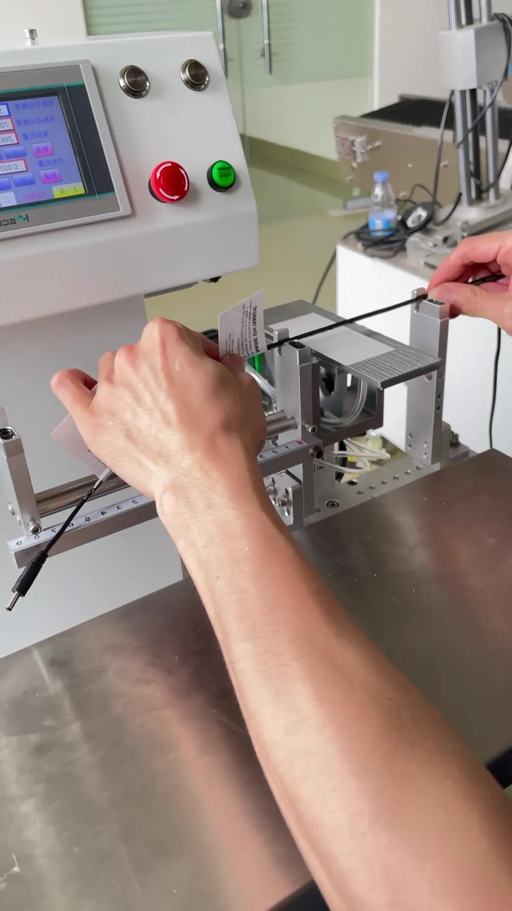 Semi-Automatic Fold-Over (Flag) Labeling Machine for Cables — Factory demo video still