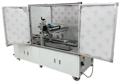 Dual-Head Tape Applicator with Magnetic Unloading — Dual-head tape applicator with magnetic unloading (custom build, enclosed frame)