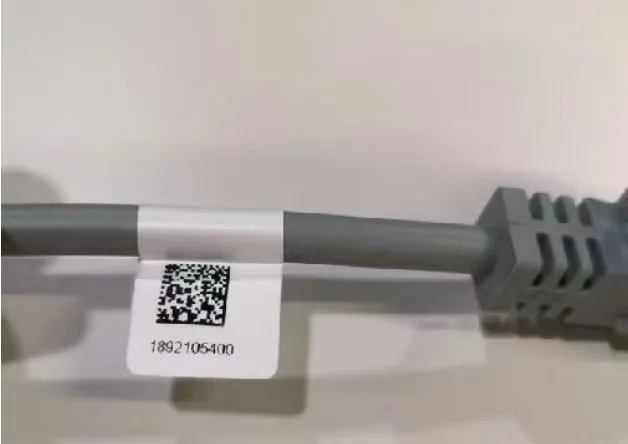 Semi-Automatic Print-and-Fold Cable Labeling Machine — Cable with a printed QR-code label