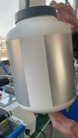 Semi-Automatic Round Bottle Labeling Machine — Plastic bottle with a clear label