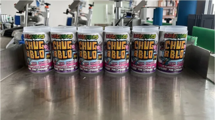 Automatic Positioning Round Bottle Labeling Machine — Cans with wrap-around labels
